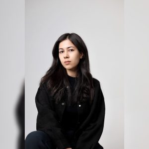 Walk Your Story: Local Designer Turns Sneakers Into Wearable Art